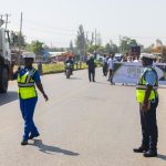 Police control traffic at Ahero during judiciary open day